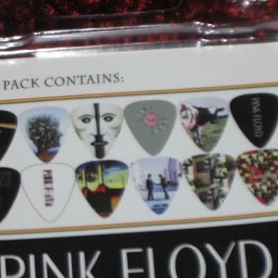new in package (old stock) A+ Perri's Leather Ltd. / Perri's 12 Pack Of Pink Floyd Guitar Picks - Med Gauge - Celluloid Plastic, 351 shape - but slightly curved (LP12-PF1) LP12PF1 image 22