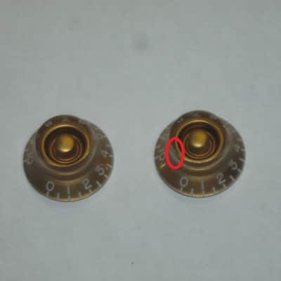 TWO very lightly used genuine Gibson Gold TOP HAT Knobs (ONLY 2 of the 4 knobs from PRHK-020 set are for sale) TOP Edge of ONE OF THE KNOBS has two very short very light nick image 2