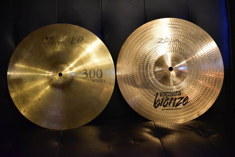 A Zildjian and Camber Cymbal A Zildjian Scimitar bronze bottom high hat 14"/36 cm and a Camber 300 Series image 1