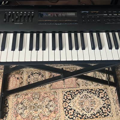 JV-80 61-Key Multi-Timbral Synthesizer + SR-JV80-08 Keyboards of the 60s & 70s and SR-JV80-04 Vintage Synth