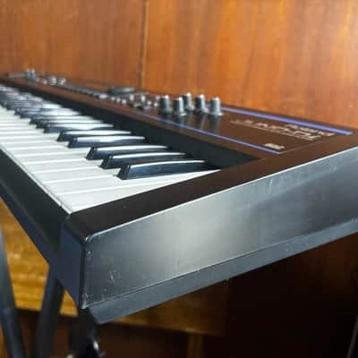 Roland Juno-Di Portable 61-key Mobile Synthesizer w/ bag power supply image 7