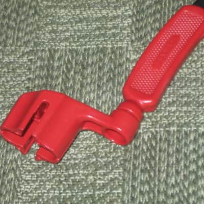 new old stock open package A+ D'Addario / Planet Waves 1st ver Pro-Winder RED String Winder & Cutter & Bridge PIn Puller, has different handle design than current DP0002 model,  from 2000s - for guitars, banjos, ukuleles, and mandolins image 10