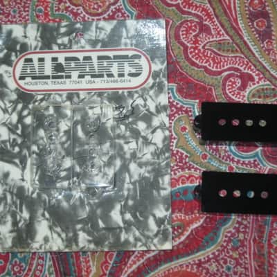 new + packaging (covers have some manufacturing imperfections) Allparts PC 0951-023 Black Pickup Cover Set (two individua covers) for Precision Bass / for P Bass - black, plastic, PC-0951-023 (never used, packaging opened to examine condition of covers) image 1