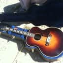 gibson J-200 1951 Sunburst, well worn restored solid old guitar.