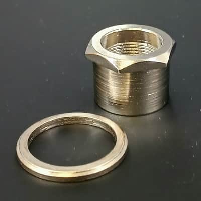Hipshot Nickel Bass Tuner Adapter Bushing - 1/2" LIC USA to 23/32" (18mm )  0206708NUT-N