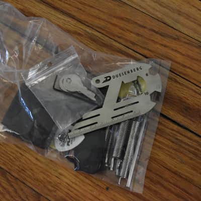 Mixed guitar and gear accessory lot, over 50 items, hardware , strings, tools, pickguards, ect. image 22