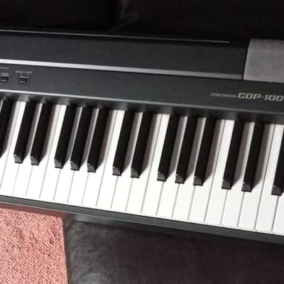 Casio CDP-100 digital piano 88 weighted keys, PSU, manual, music stand