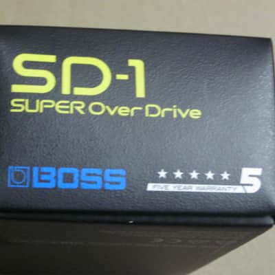 lightly handled - generally mostly very clean Boss EMPTY BOX for SD-1 SUPER OverDrive (NO pedal / NO paperwork) specifically from 2020 - but can be home for other year SD1 pedal) outside of box is black with yellow, light blue, & white graphic image 13