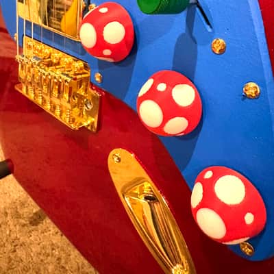 1 of 1 Custom Super Mario Nintendo Red Electric Guitar Strat Style / ST HSS | Mushroom Control Knobs | Green Warp Pipe Pickup Switch | Gold Pickups / Bridge / Tuning Pegs / Input Jack | Hand Painted Blue Pickgaurd | Red & Blue Guitar image 3