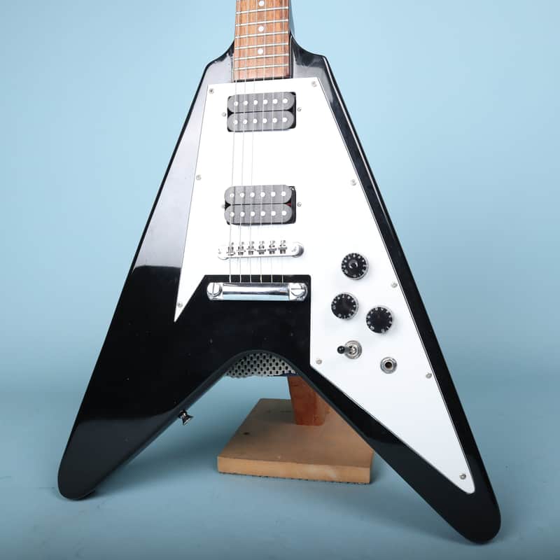 Flying V Style Electric Guitar in Black with White Pickguard image 1