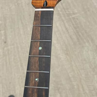 5a Striped Ebony Fretboard 22frets 5a Roasted flame Maple guitar neck Radius 12inch Round stainless steel 22 frets Roasted flame Maple guitar neck Striped Ebony fingerboard 25.5inch hole 10mm Radius: 12 inches. image 3