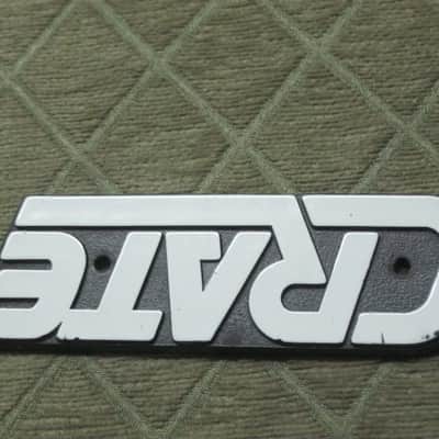 used - some imperfections genuine Crate bass amp Crate LOGO Plate (badge)- hard plastic - with 2 original screws (from a BX15 or BX25 bass amp - NO bass amp included) 1990s - early 2000s - Hard Plastic, white & black image 17