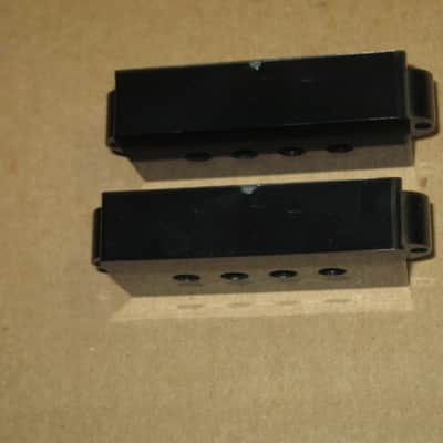 new + packaging (covers have some manufacturing imperfections) Allparts PC 0951-023 Black Pickup Cover Set (two individua covers) for Precision Bass / for P Bass - black, plastic, PC-0951-023 (never used, packaging opened to examine condition of covers) image 11