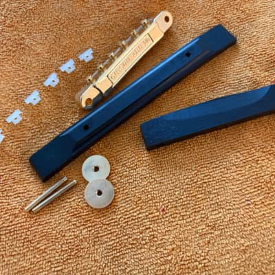 NOS-70’s Gibson Ebony Archtop/Carved Top Bridge Base & Saddle Assembly Polished Grade #1 Ebony w/ Gold Hardware and 2025  ABR-1 Wired 24K Gold Plated bridge - COMBO image 1