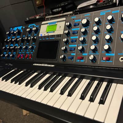 MiniMoog Voyager Signed by Bob Moog Electric Blue Edition w/ expander and pedal image 7
