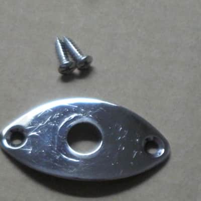 used (lightly relic'd) Gotoh JCB-2 Oval-shaped 2 screws Chrome metal  jack plate - also called JCB-2 Football Shaped 2 screw Chrom jack plate) Chrome plated brass (screws included) from 2010s image 1