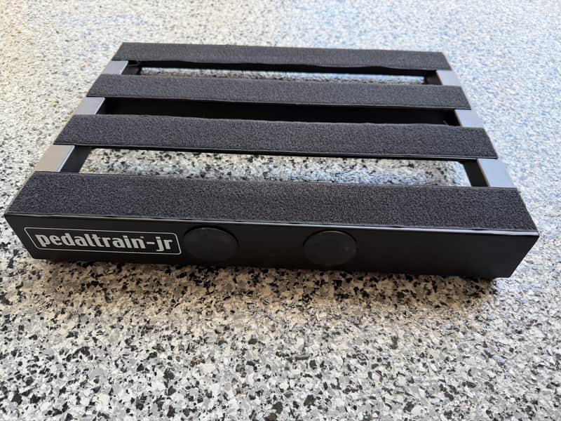 Black and silver power strip with "SPOT PRO" branding, cables visible.