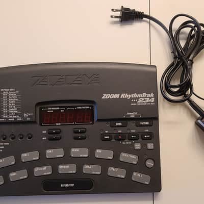Cleaned Zoom RT234 drum machine with power adapter, fresh internal battery