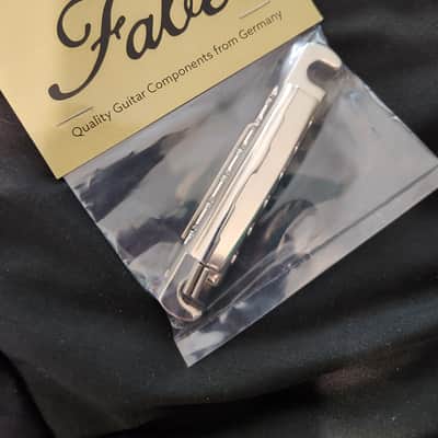 MojoAxe CWT-UA (un-aged) Wraparound Wrapover Tailpiece Nickel MojoAxe CWT-UA (un-aged) Wraparound Wrapover Tailpiece Nickel