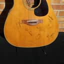 1971 Yamaha FG-180 Signed by Merle Haggard and Leona Williams