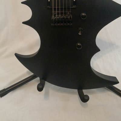 Trinity Bat-el'-ax image 2