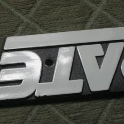 used - some imperfections genuine Crate bass amp Crate LOGO Plate (badge)- hard plastic - with 2 original screws (from a BX15 or BX25 bass amp - NO bass amp included) 1990s - early 2000s - Hard Plastic, white & black image 19