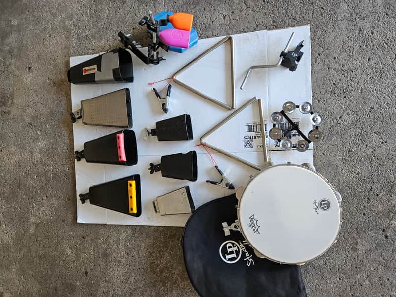 Latin Percussion Lot of LP pro percussion gear - cowbells,  triangles, ching ring, sambago bells, jam block, pandeiro