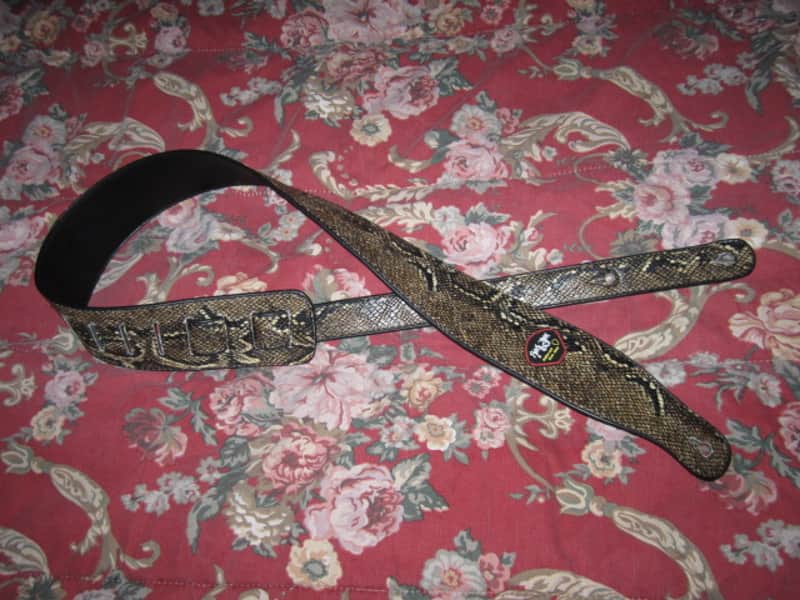 lite use RockYou (Rock You) PU Faux Leather Snakeskin Pattern Guitar Strap (front: brown, tan, black pattern) (back: black) reversible - main part of strap 2 & 3/4" wide, belt part 1 & 1/4" wide [polyurethane leather] Adjustable Length from 44" to 53" image 1