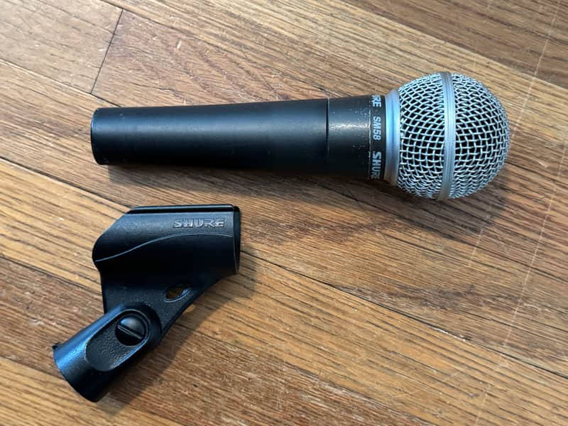Shure SM58 Handheld Cardioid Dynamic Microphone with Clip and Pouch. image 1