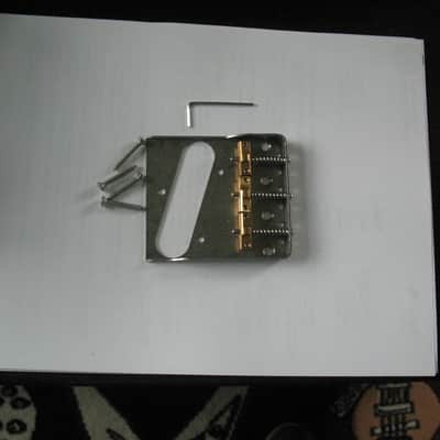 Logan custom Stainless Steel bridge plate with brass compensated saddles 2024 - Raw stainless Steel image 1