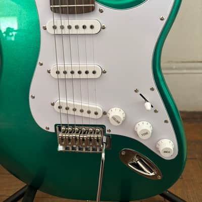 Custom Built 2026 guitar, Mahogany Body, Maple neck with laurel fingerboard. Metallic green body. Pro setup done play's great. Upgraded locking tuners, Matching Bridge image 7