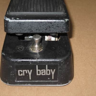 used vintage 1970s (Ser # 1972574) Thomas Organ Cry-Baby Wah, model 95-910511, has orig TDK 5103, + battery (pot is NOT scratchy, works fine) battery clip was repaired, original foam padding for battery compartment area replaced, + extra rubber feet image 3