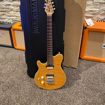 Ernie Ball Music Man Axis Super Sport lefty Natural Flame Maple Top image 1