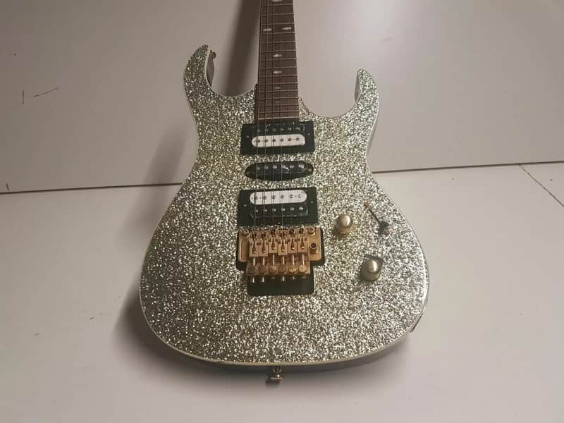 SILVER SPARKLE RG ROCK AXE image 1