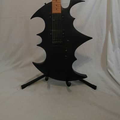 Trinity Bat-el'-ax image 1