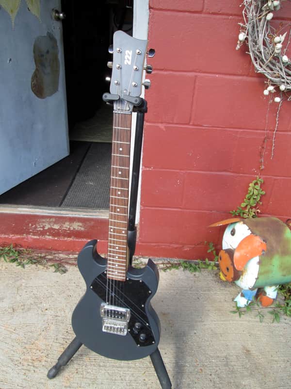 FIRST ACT Electric Guitar model 222 small "heavy" solid body electric guitar scale length 25" image 1