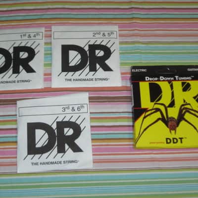 ONE SET new in package DR DDT-11 Drop-Down Tuning Electric Guitar Strings (11, 15, 19, 32,42, 54) Nickel-Plated Steel, Coated Core Technology, Core Wire: Hexagonal image 1