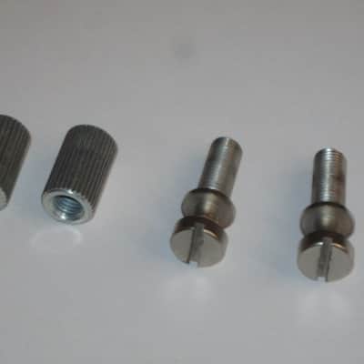 ONE pair of used (lightly relic'd) Gibson (API) Brushed Satin NICKEL finish STUDS (mounting pieces) and Silver finish ANCHORS (inserts) from 2014, for PTTP Brushed Satin NICKEL Finish Stop Bar Tailpiece (Stop Bar Tailpiece NOT included) image 1