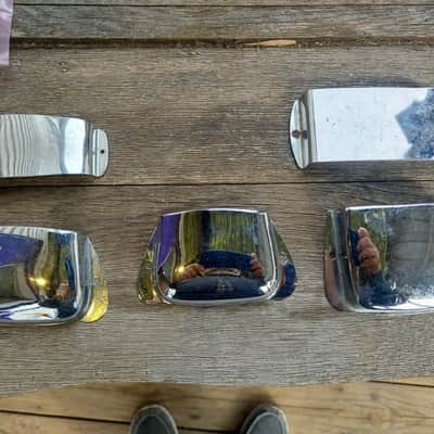 Vintage Fender? Precision/Jazz Bass bridge and pickup cover lot. image 1