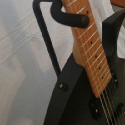 Trinity Bat-el'-ax image 5