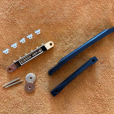 NOS-70’s Gibson Ebony Archtop/Carved Top Bridge Base & Saddle Assembly Polished Grade #1 Ebony w/ Gold Hardware and 2025  ABR-1 Wired 24K Gold Plated bridge - COMBO image 4