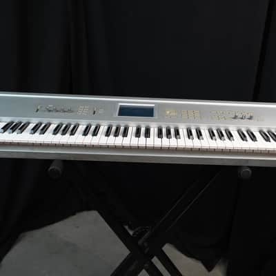 Korg Triton Pro 76-Key 62-Voice Polyphonic Workstation 1999 - 2000 - Silver