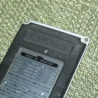 used medium relic'd genuine Boss Bottom Plate (Silver Label Taiwan) for compact (regular) size pedal, from March 1991 - PLATE PART: Metal w/ Silver Finish / BOTTOM LABEL: SLT / EXTERIOR PADDING: Black stiff hardened rubber - NO: pedal/screws/other items image 9
