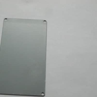 lite use Boss Bottom Plate for compact (regular) size) pedal (NO label, NO rubber padding, NO cut out for power jack, NO screws) metal, gray finish on both sides, from 2011, from Taiwan made Boss pedal - but can fit Japan made pedal (NO other items) image 3