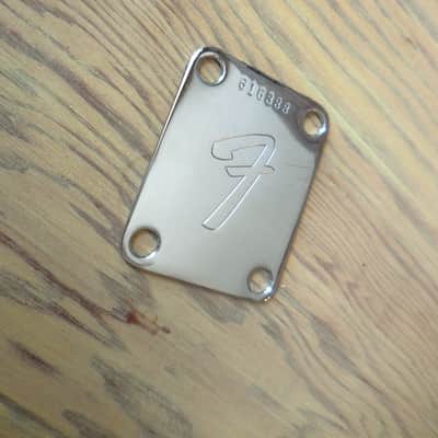 Fender Neck Plate 70's Serial Number with Original bolts. image 1