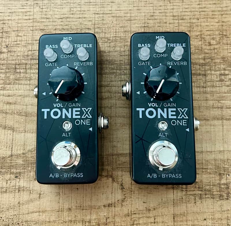 Black TONEX ONE guitar effects pedal with knobs and switches.