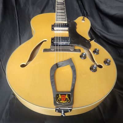 Hagstrom HJ500 Natural Gloss Hollow Body Electric Guitar – Jazz Archtop – Dual Humbuckers – Hardshell Case 2000s - 2010s - Natural Gloss Top with Dark Figured Back & Sides image 1