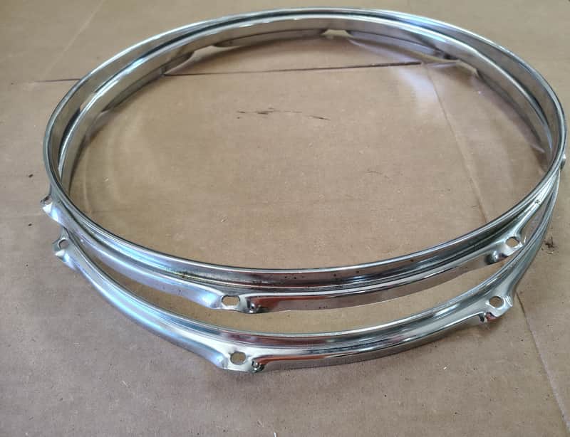 two unknown maker 16"8 hole triple flange drum hoops image 1