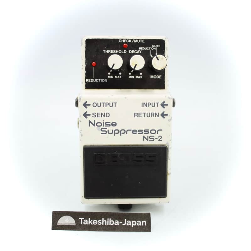 White and black electronic effects pedal with knobs and labeled controls.