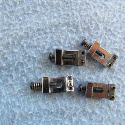 Vintage Fender Stratocaster Bridge Saddles Set Of 4 1970's Era Fender Stratocaster Bridge Saddles Part Number 027037 Set Of 4 image 1